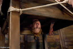 Madison Young comes hard in severe ropes bondage and suspension.