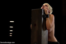 Angel-faced filthy whore Chloe Camilla metal-bound ass out on spinning device with hard caning and pussy clamps!...