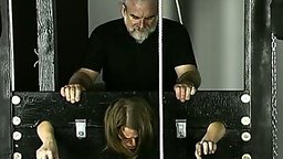 Pain and bondage in a well-equipped dungeon. Under the guidance of a dungeonmaster, one woman disciplines another. The submissive...