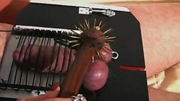 Fetish Mistress Carmen Rivera tends to one of her loyal slaves, who has a problem with his penis...he has lost sensation...