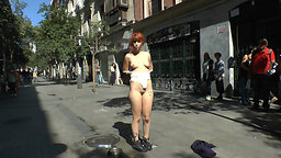 Innocent Lilyan Red is shamed around the streets of Madrid.